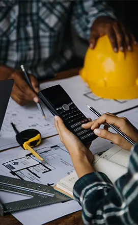 Procurement specialists reviewing project documentation and supplier data in North Carolina.